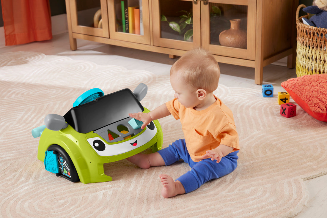 Fisher-Price Laugh & Learn Sit & Steer Driver