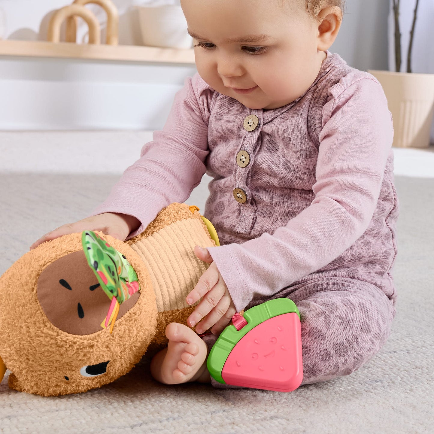 Fisher-Price Snuggly Snacky Capybara Plush Baby Sensory Toy with Teether & Rattle for Newborns